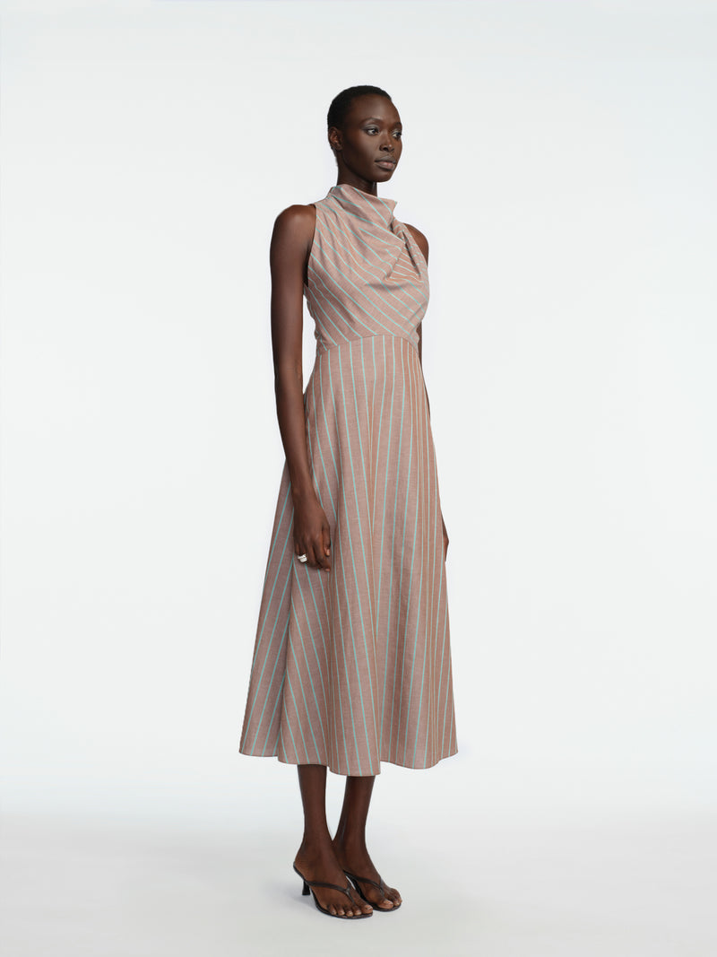 cotton halter dress Aloe Organic Beach it features a breezy halter neckline with a tie Cotton & Linen Halter A